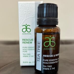 Arbonne Rescue & Renew Tea Tree Essential Oil - Brown and Green